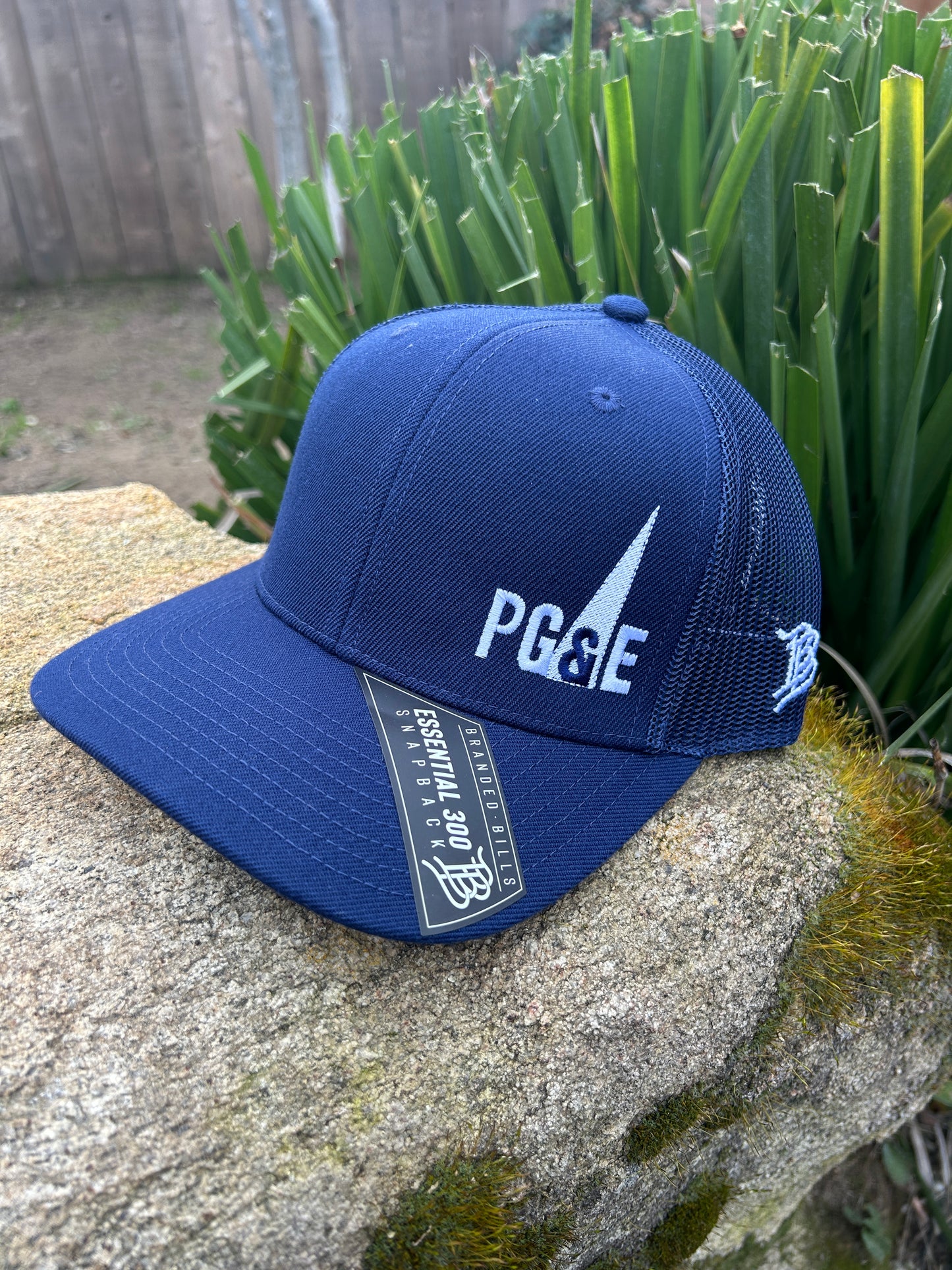 Branded Bill 300 Trucker Curved Bill Triangle Logo